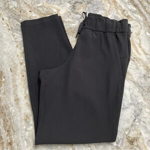 Lululemon On the Fly 7/8 Black Woven Pants Size 4 Office Casual Travel 27"